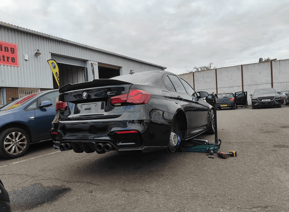 Mechanic working on a car